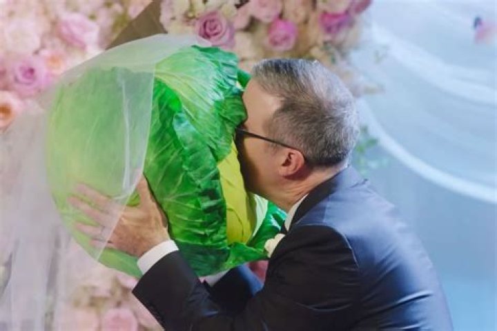 John Oliver Marries a Cabbage